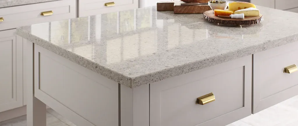 Kitchen island with granite top and brass hardware