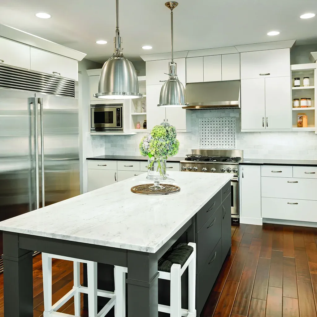 Modern kitchen featuring white cabinetry