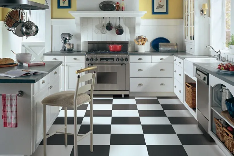 Modern kitchen with checkered floor stainless steel appliances Modern kitchen with checkered floor, stainless steel appliances