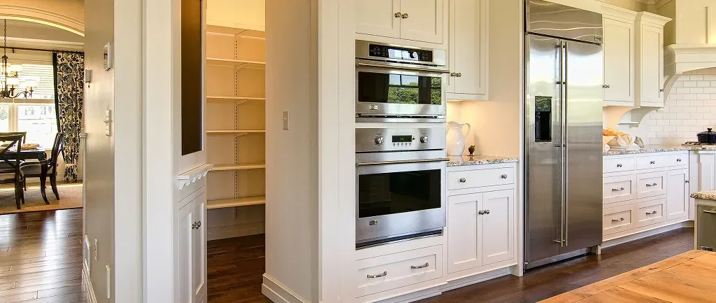 Modern kitchen with stainless steel appliances and cabinets Modern kitchen with stainless steel appliances and cabinets