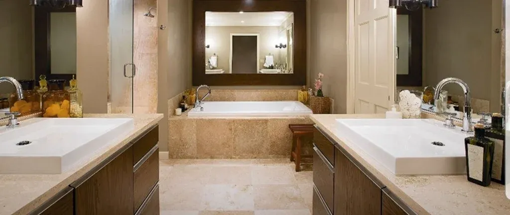 Spacious bathroom with dual sinks and a bathtub Spacious bathroom with dual sinks and a bathtub