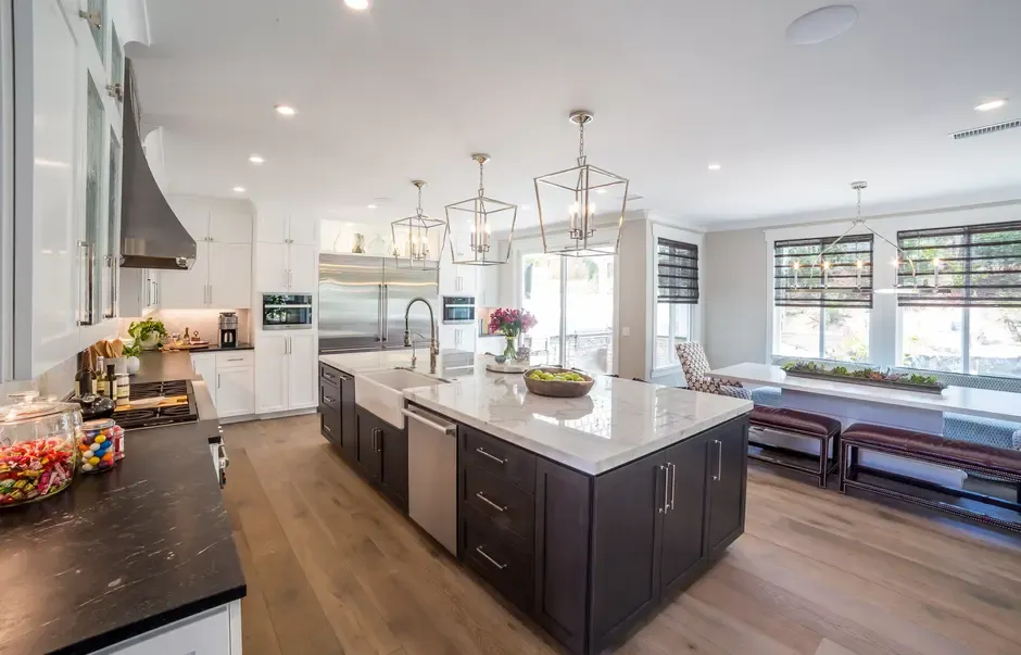 kitchen with island stainless steel appliances and natural light kitchen with island, stainless steel appliances, and natural light